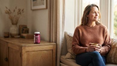 Goli Beets reviews: a woman relaxing with a warm drink at home, gummy bottle on the shelf